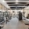 Fitness center with cardio equipment and natural light