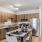 Spacious kitchen area with stainless steel appliances